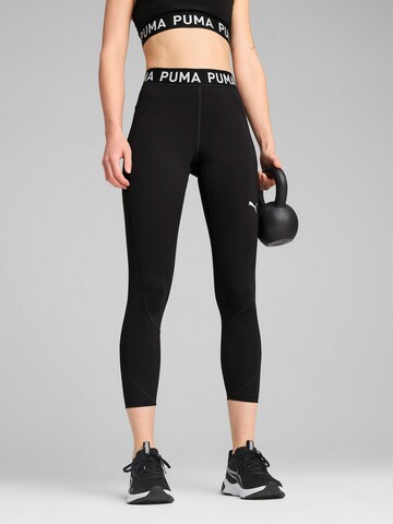 Skinny Pantalon de sport 'Strong' PUMA en noir : devant
