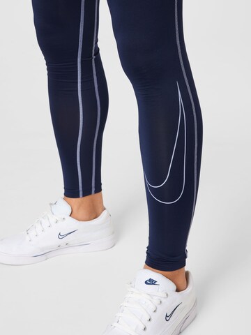 NIKE Skinny Sporthose in Blau