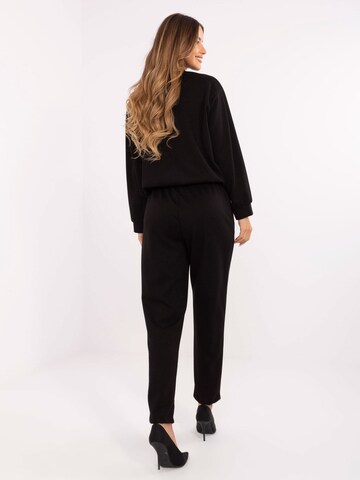 Madnezz House Jumpsuit '9731.49' in Schwarz