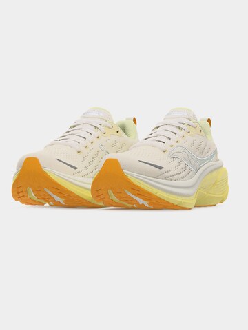 Chaussure de course saucony en beige