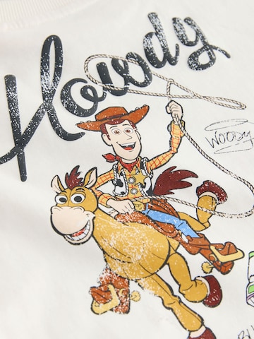 Next - Conjuntos 'Toy Story' em bege