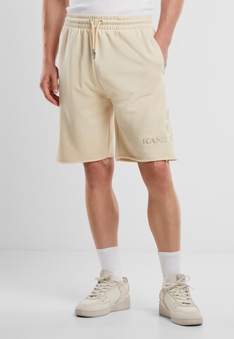 Regular Pantalon Karl Kani en beige : devant