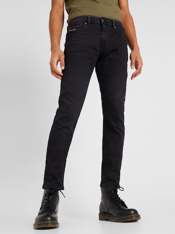 Coupe slim Jean 'STRUKT' DIESEL en noir : devant