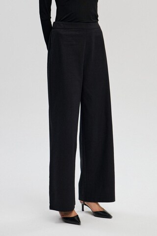 Touche Prive Wide Leg Hose in Schwarz: Vorderseite