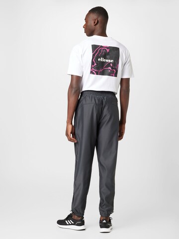 ELLESSE Tapered Trousers 'Skeptra' in Black