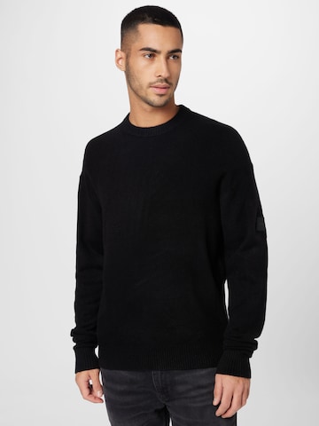 Calvin Klein كنزة صوفية بلون أسود: الأمام