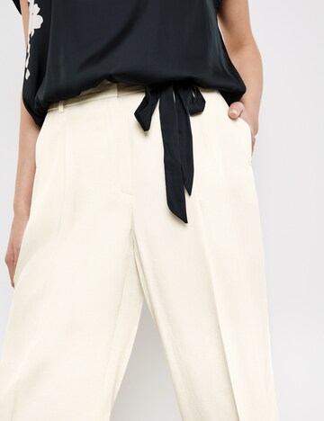 TAIFUN Loose fit Pleat-front trousers in Beige