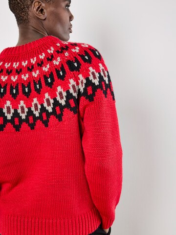Pull-over ' ' Apricot en rouge
