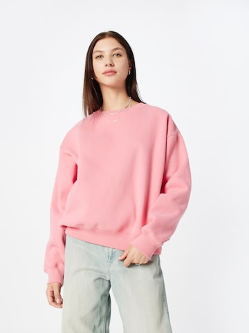 Superdry Sweatshirt 'ESSENTIAL' in Roze: voorkant