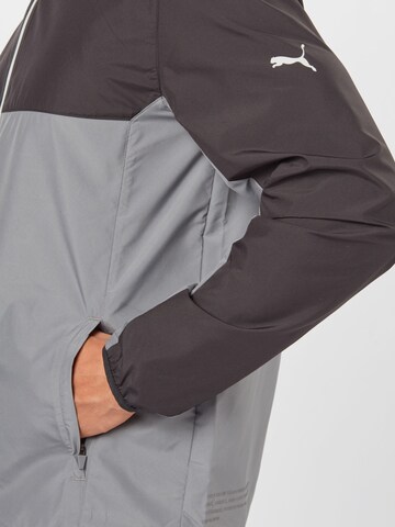 PUMA Sportjacke 'First Mile' in Grau