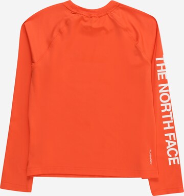 THE NORTH FACE - Camiseta funcional 'AMPHIBIOUS' en naranja