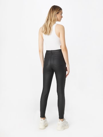 Slimfit Jeans di River Island in nero