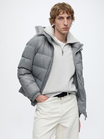 Calvin Klein Jeans Zimska jakna | siva barva