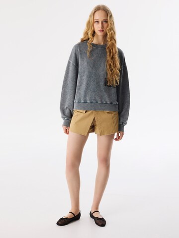 Sweat-shirt Twist en gris