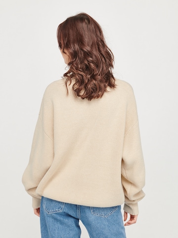 Pullover 'Faith' di ABOUT YOU x VIAM Studio in beige: dietro