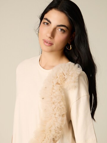 Maglietta di oltre in beige