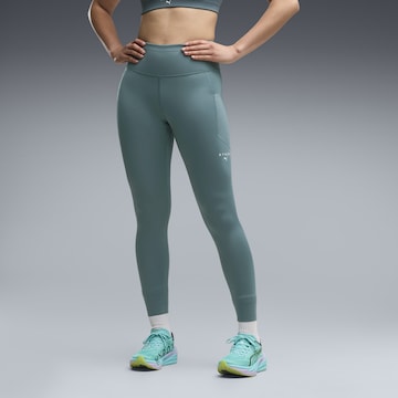 PUMA Skinny Sportbroek 'Puma x Hyrox Pwrmode' in Groen: voorkant