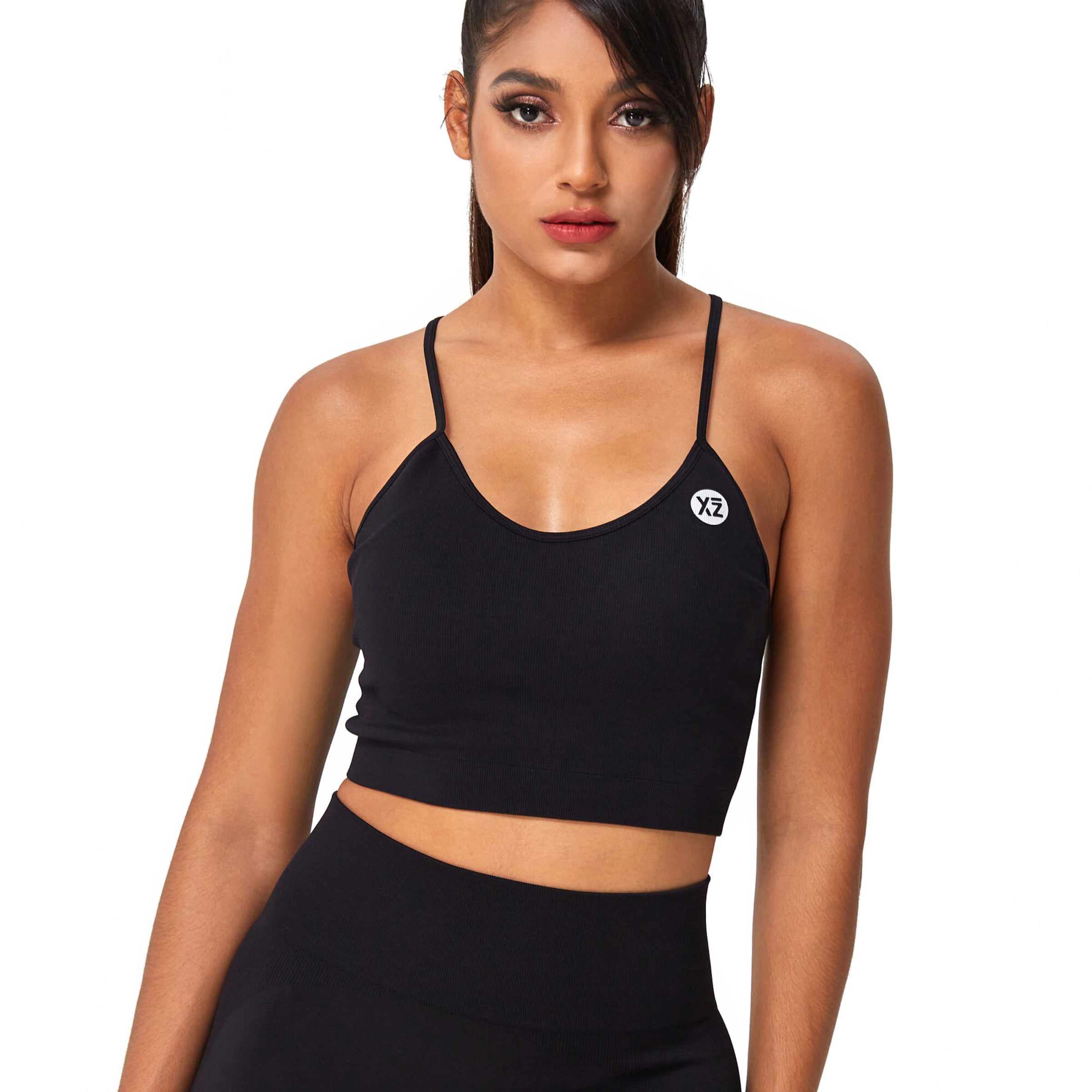Top sportivo 'Charm' di YEAZ in nero