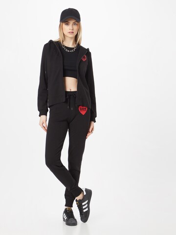 Effilé Pantalon Love Moschino en noir