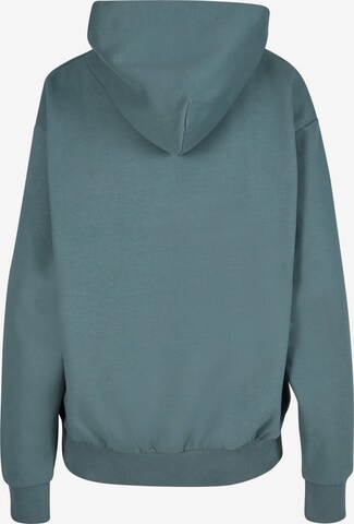 Sweat-shirt Karl Kani en vert