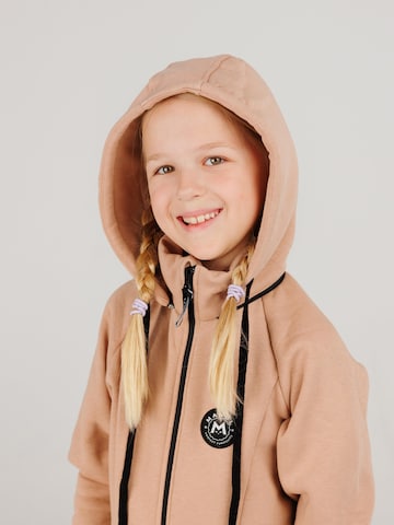 Tuta 'Biscuit by MANUL - Smart BackZip' di MANUL in beige