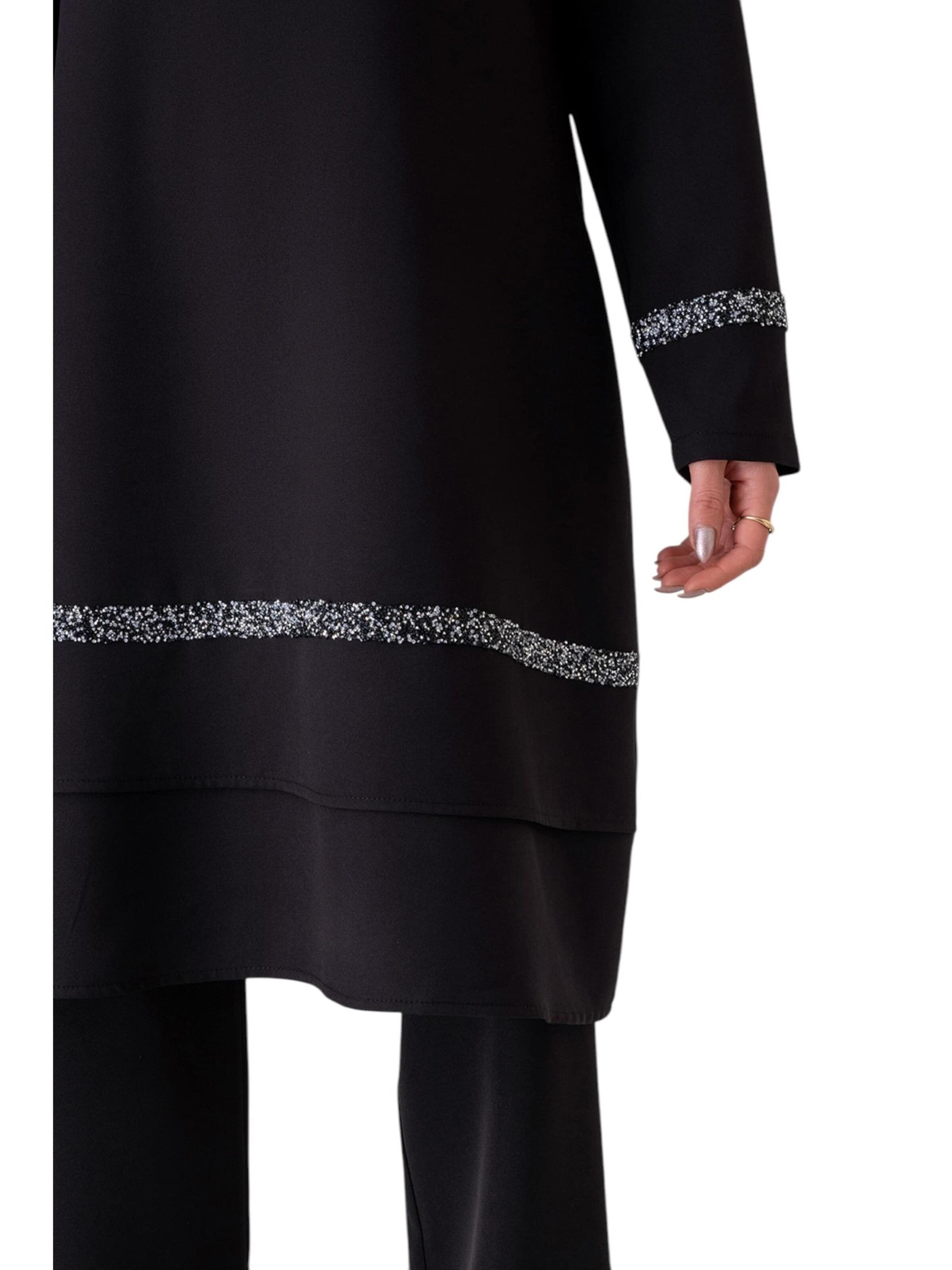 Completo pantalone 'NEVRA' di fashionshowcase in nero