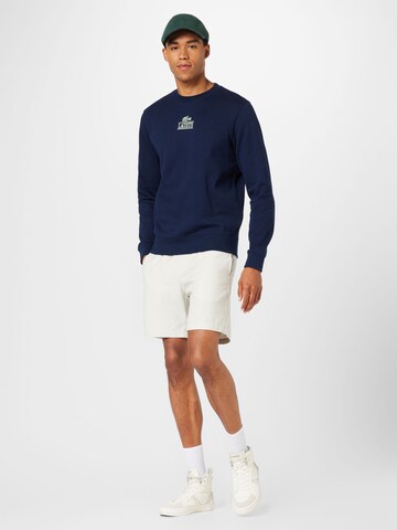 Sweat-shirt LACOSTE en bleu