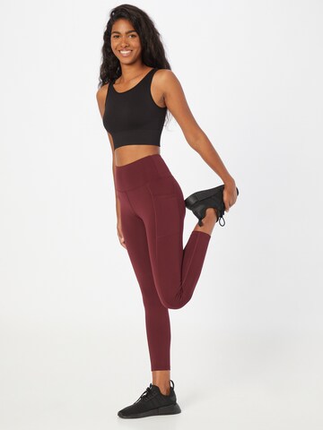 Skinny Pantaloni sportivi di Marika in rosso