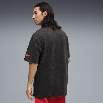 PUMA Funktionsshirt 'F1® Tyre' in Schwarz