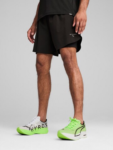 PUMAregular Sportske hlače 'Puma x Hyrox' - crna boja: prednji dio