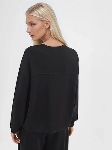 Busem - Sweatshirt em preto