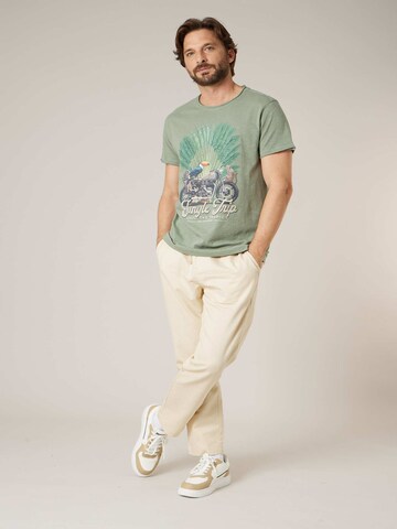 T-Shirt 'AVENTURA' Deeluxe en vert