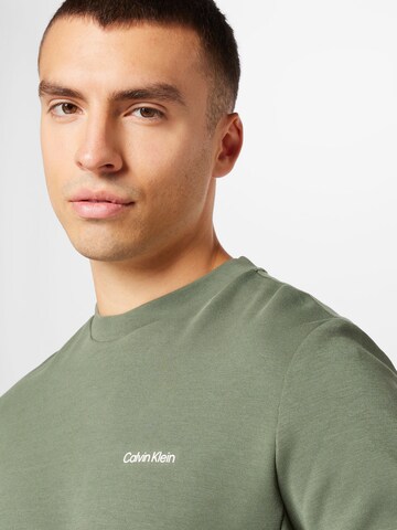Bluză de molton de la Calvin Klein pe verde