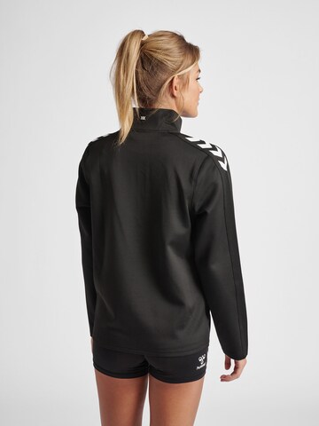 Veste de survêtement 'CORE XK' Hummel en noir