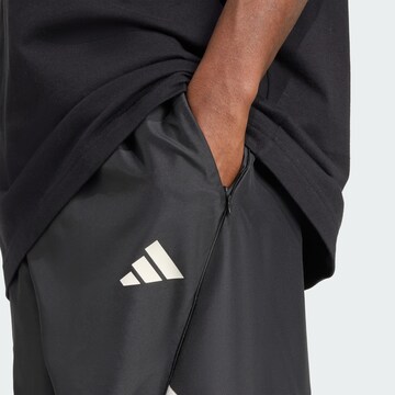 ADIDAS SPORTSWEAR Tapered Παντελόνι φόρμας 'Stadium' σε μαύρο