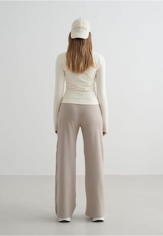 Loosefit Pantalon de sport 'Sense' Aim'n en beige