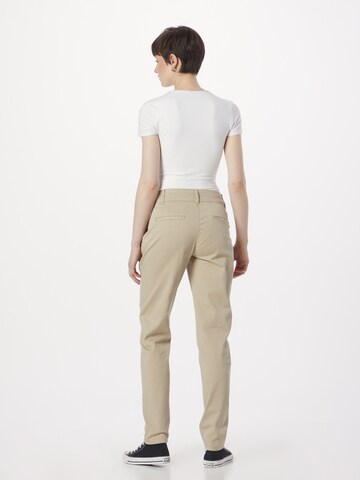 QS Slimfit Chinohousut värissä beige