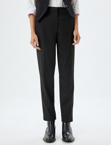 Koton Regular Trousers with creases in Black: front