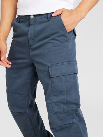 Loosefit Pantaloni cu buzunare de la Carhartt WIP pe albastru