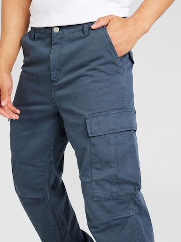 Carhartt WIP Широка кройка Карго панталон в синьо