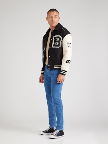 Tommy Jeans Slimfit Jeans 'AUSTIN' in Blauw