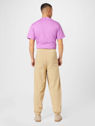 Calvin Klein Jeans Zwężany krój Spodnie w kolorze beżowy