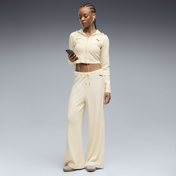 PUMA Wide leg Broek 'Essentials' in Geel