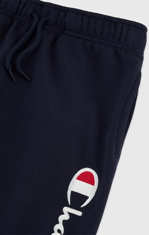 Tapered Pantaloni di Champion Authentic Athletic Apparel in blu