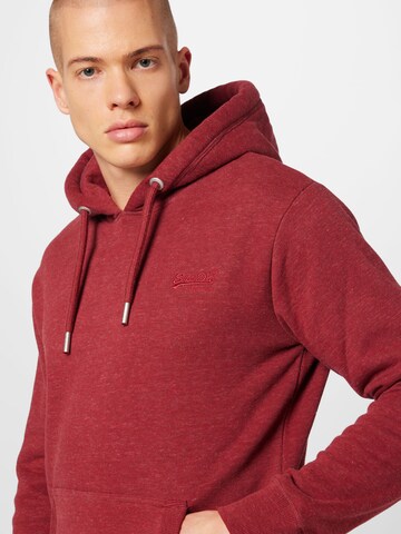 Superdry - Sudadera en rojo