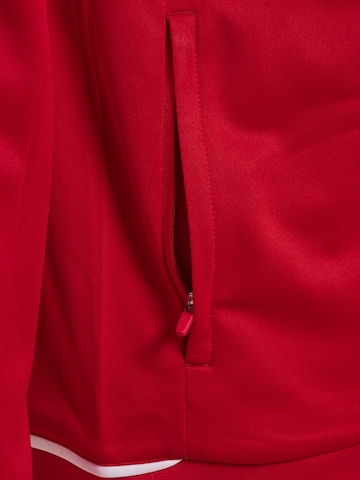 Veste de survêtement Hummel en rouge