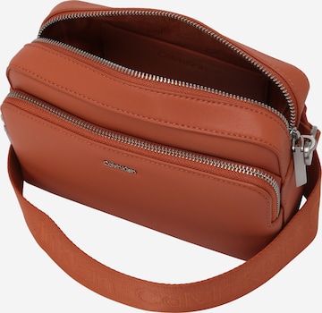 Calvin Klein Crossbody Bag in Orange