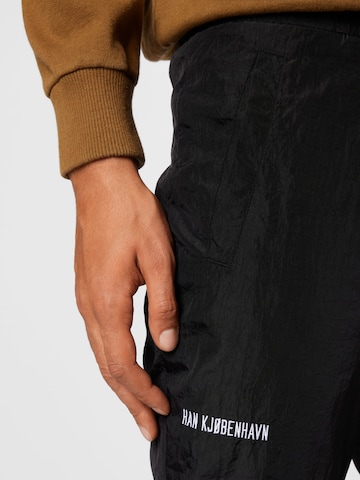 Han Kjøbenhavn Tapered Trousers in Black