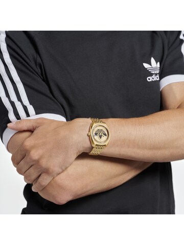 ADIDAS ORIGINALS Analog Watch in Gold: front