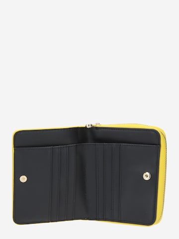 TOMMY HILFIGER - Cartera 'Iconic' en amarillo